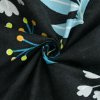 Black fabric with colorful floral patterns
