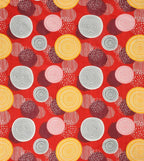 Pattern of circles and dots on a red background