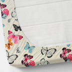 Butterfly-patterned fabric on a white background